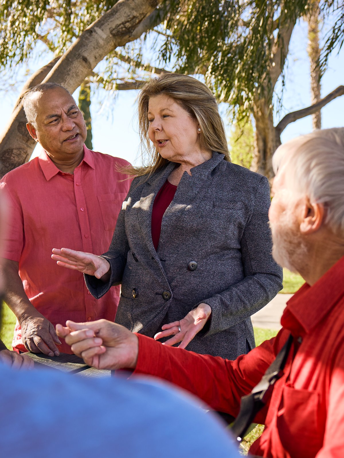 Anne Hertz-Mallari speaking with Cypress residents